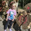 Child by axe throwing targets at Adventure Now Manchester