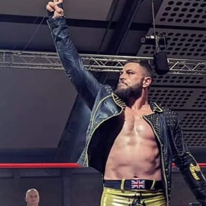 WAW Wrestling champion on stage