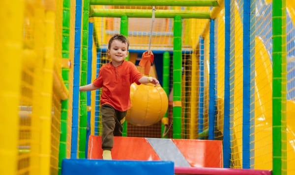 Kids enjoying soft play as a rainy-day indoor activity