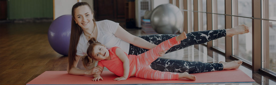 mother and child practicing yoga