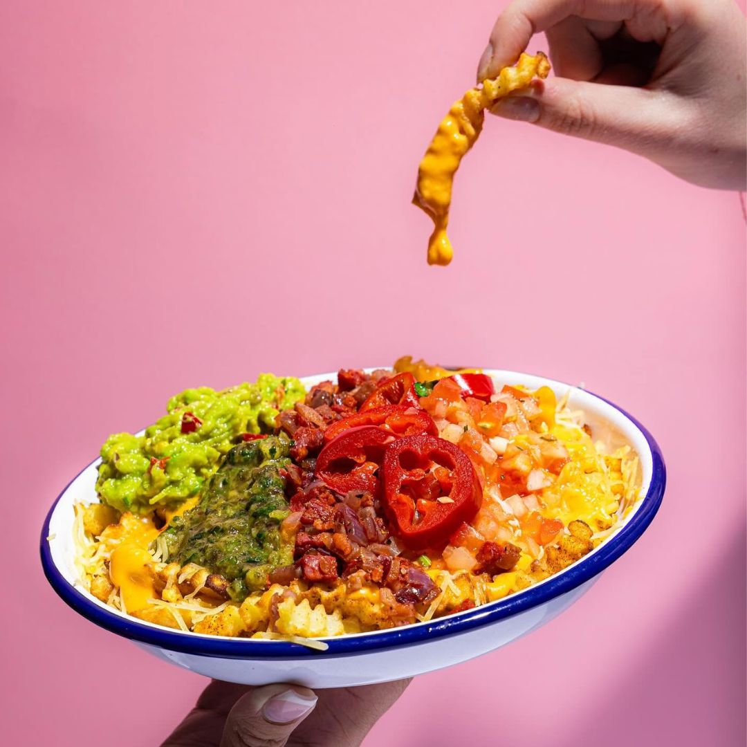 Barburrito rice bowl with guacamole and jalapeños