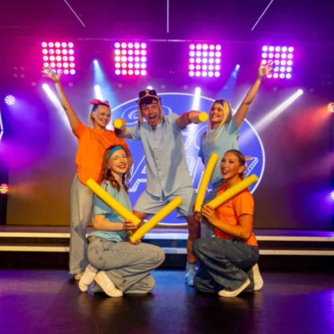 Go Go Danny cast on stage
