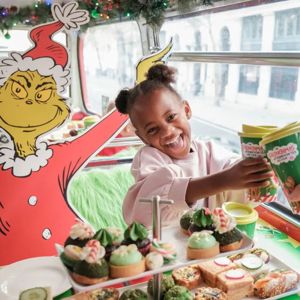 Child enjoying Grinchmas Afternoon Tea Bus Tour
