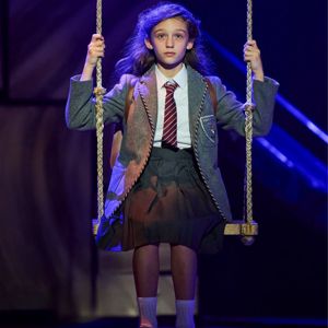Matilda on the swing in Matilda The Musical