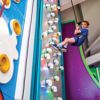 Colourful climbing walls at Out of Bounds