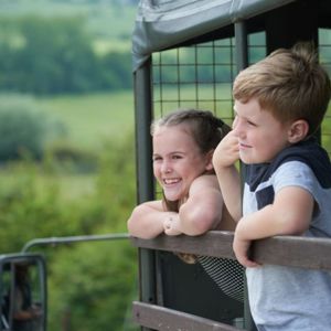 Family on safari truck at Port Lympne Reserve