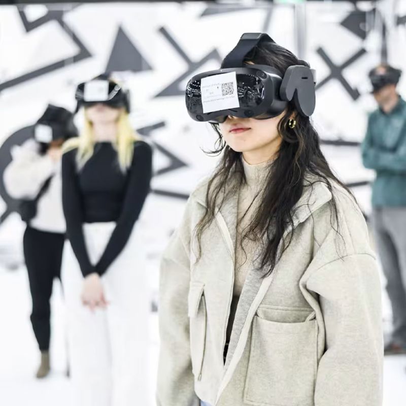 Visitor wearing VR headset at Space Explorers