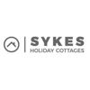 Sykes Holiday Cottages  logo