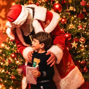Child meeting Santa at The Wundrful World of Christmas