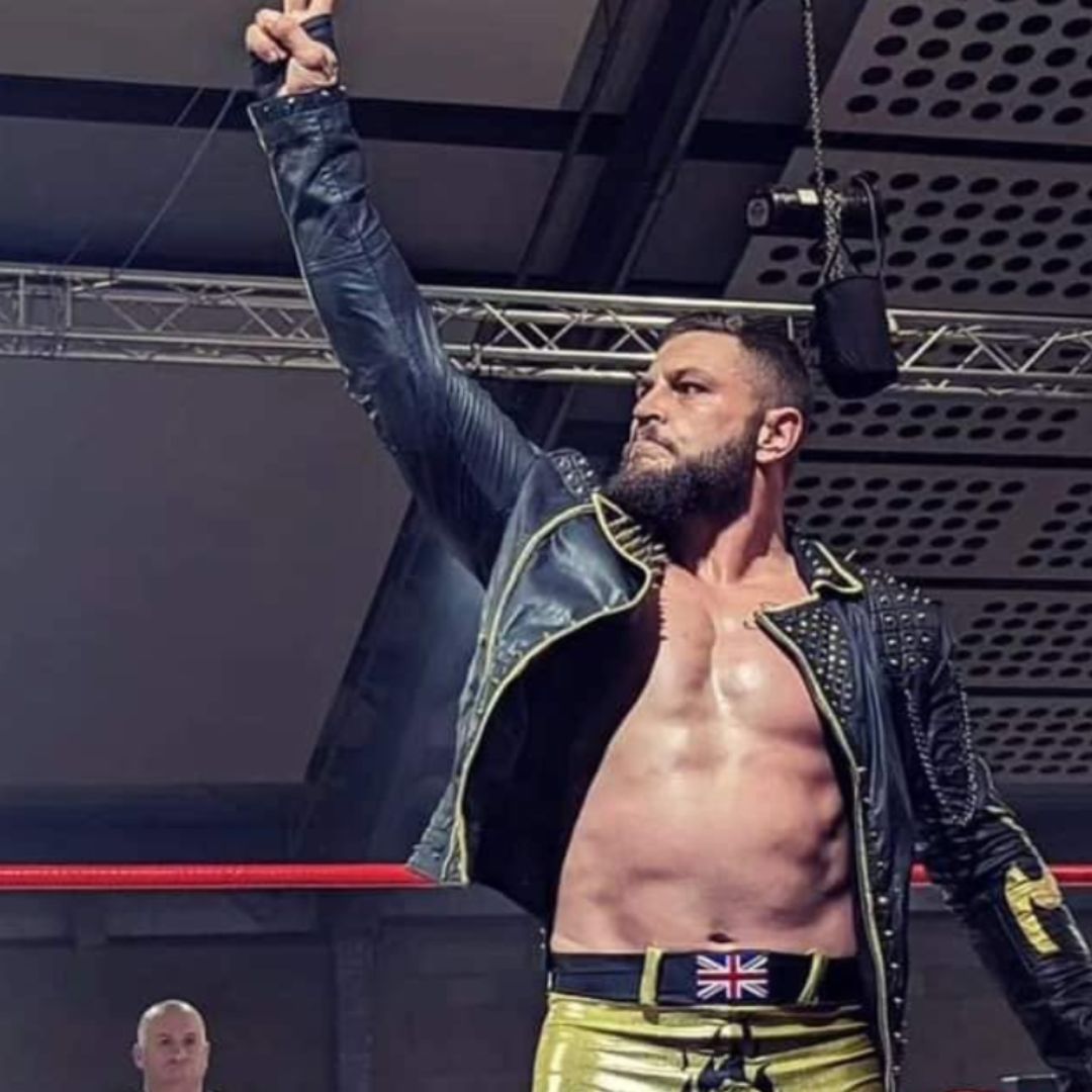 WAW Wrestling champion on stage