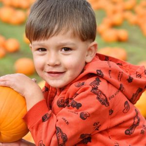 Child with pumpkin at Watermouth Castle